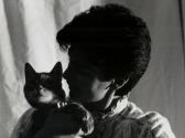 A young me with my cat, Misty