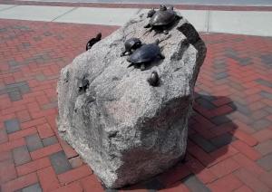 Turtles on rock sculpture